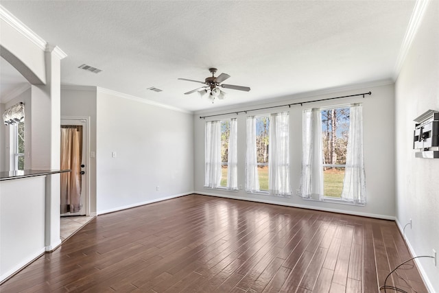 unfurnished living room featuring hardwood / wood-style floors, ceiling fan, and ornamental molding