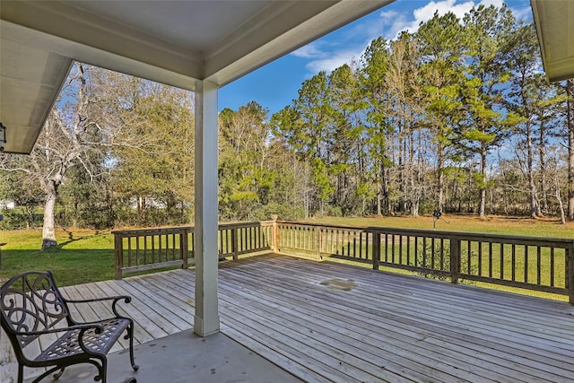 deck featuring a lawn