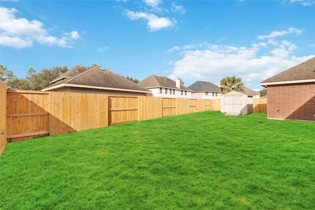 view of yard with a storage unit