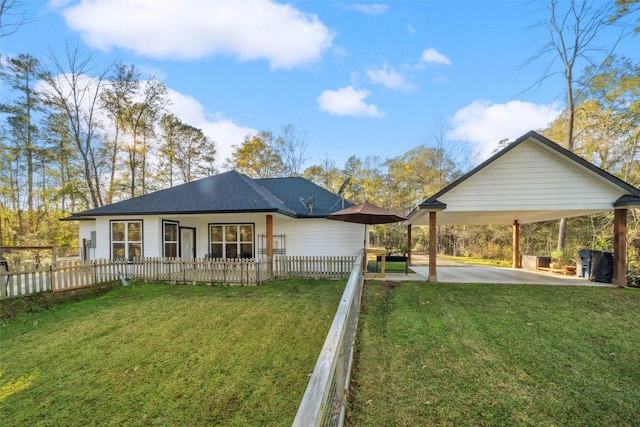 view of yard with a carport