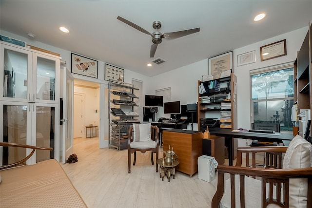 office area featuring ceiling fan and light hardwood / wood-style flooring