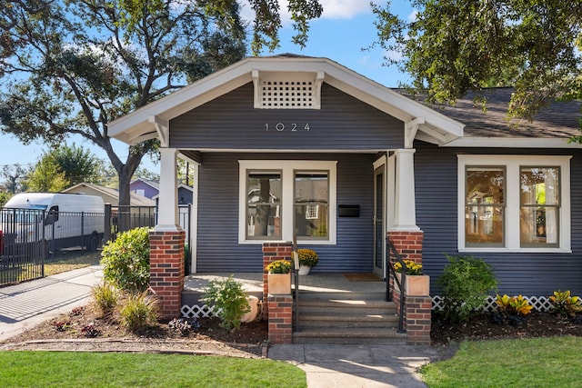 view of front of property featuring covered porch