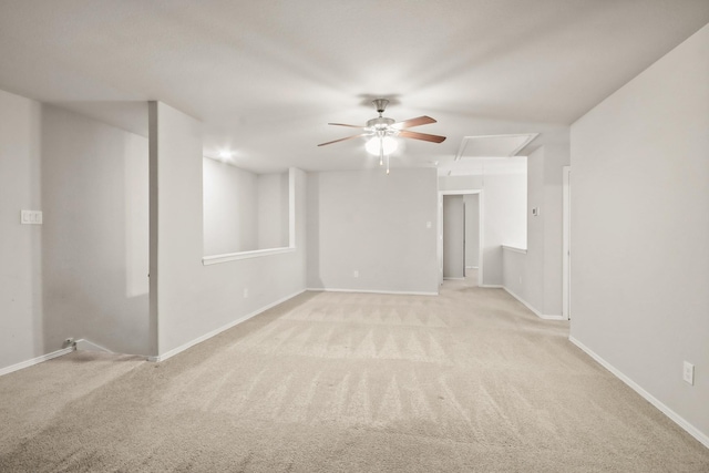 carpeted empty room with ceiling fan