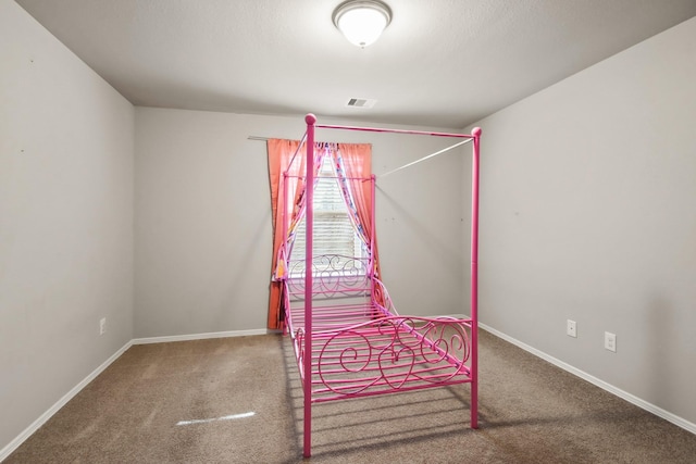 unfurnished bedroom with carpet