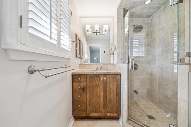 bathroom featuring a shower stall, vanity, and tile patterned floors