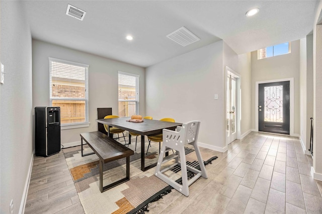 dining room with light wood-type flooring