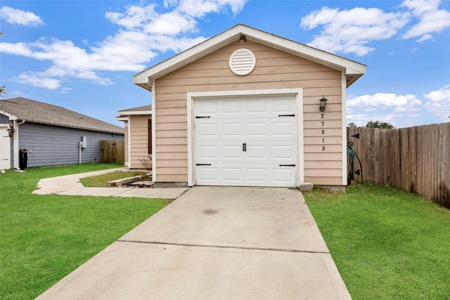 garage with a lawn