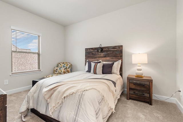 bedroom with light carpet