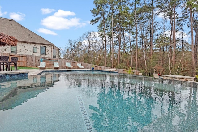 view of pool featuring a patio area