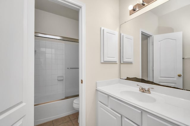 full bathroom featuring tile patterned flooring, vanity, toilet, and shower / bath combination with glass door