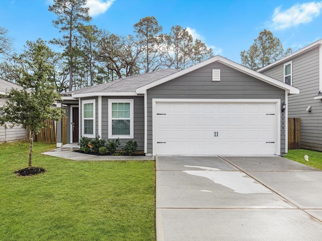 view of front facade featuring a garage and a front lawn