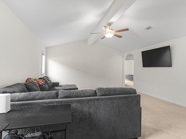 living room with vaulted ceiling with beams, carpet floors, and ceiling fan