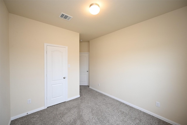 unfurnished bedroom featuring carpet flooring