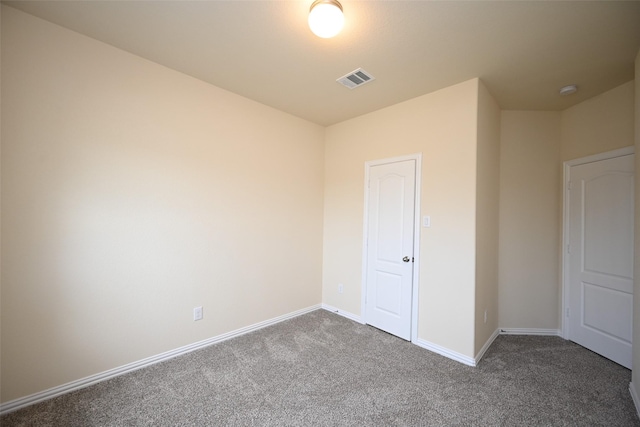 unfurnished bedroom with carpet flooring and a closet