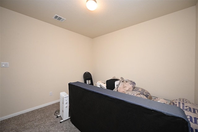 bedroom featuring carpet