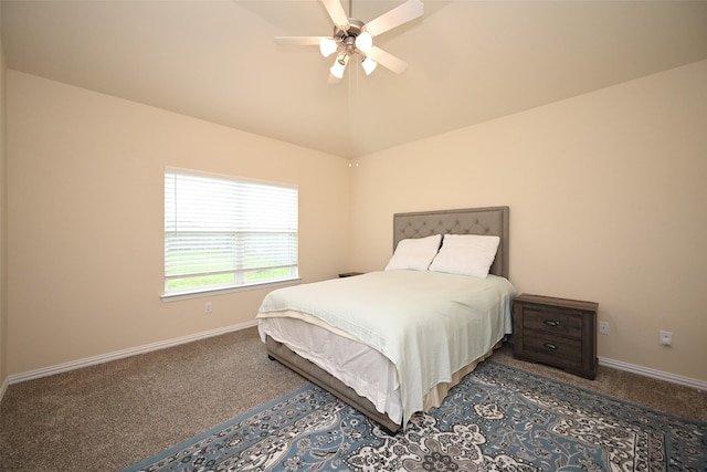 carpeted bedroom featuring ceiling fan and lofted ceiling