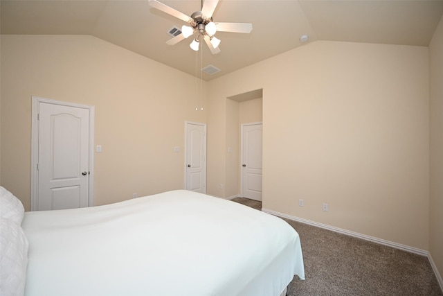 bedroom featuring ceiling fan, dark carpet, and lofted ceiling