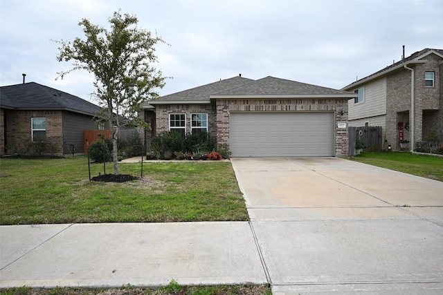 ranch-style home with a garage and a front lawn