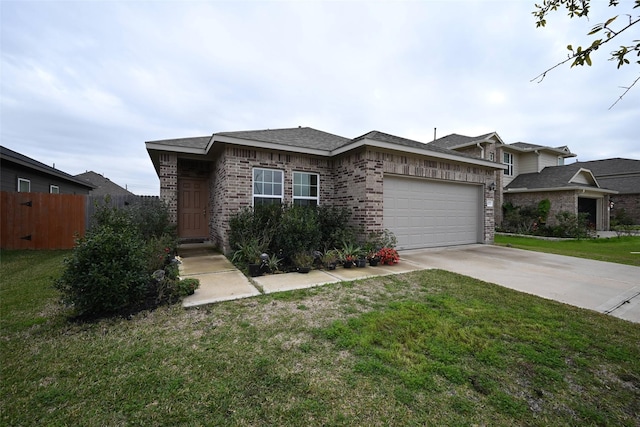 view of front of home featuring a garage and a front lawn