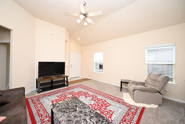 living room featuring ceiling fan, light carpet, and vaulted ceiling