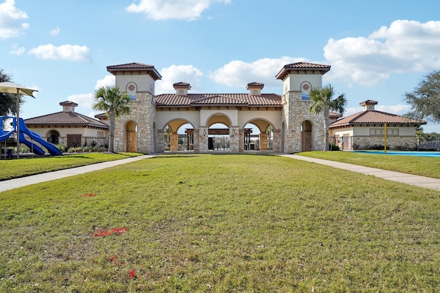 exterior space featuring a front lawn