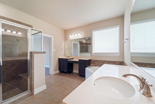 bathroom featuring vanity and shower with separate bathtub