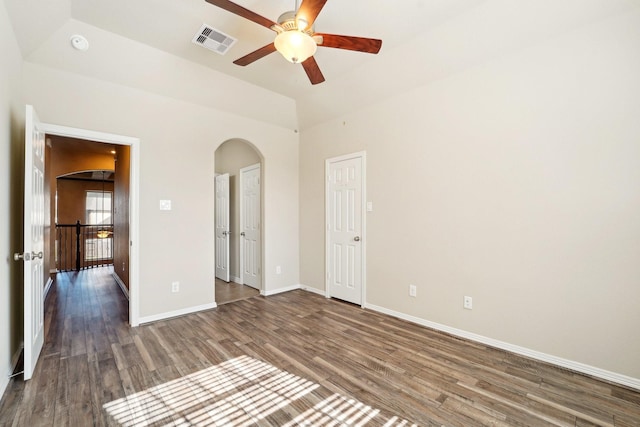 empty room featuring ceiling fan and hardwood / wood-style flooring