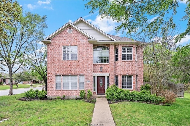 view of front of home with a front yard