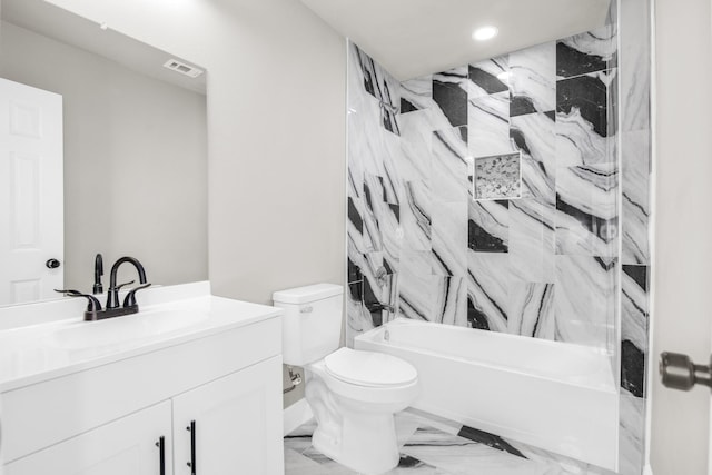 full bathroom featuring vanity, toilet, and tiled shower / bath combo