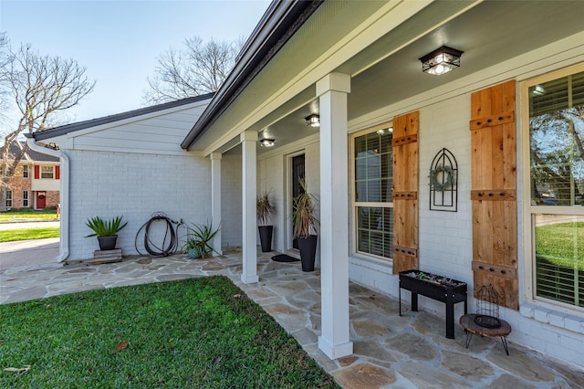 doorway to property with a porch