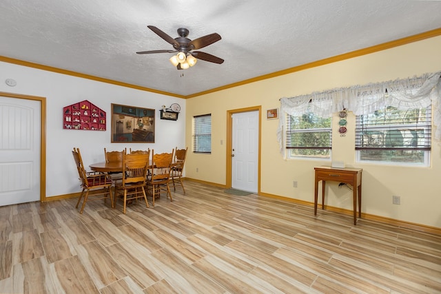 dining space featuring a textured ceiling, ceiling fan, light hardwood / wood-style floors, and crown molding