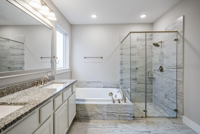 bathroom with shower with separate bathtub and vanity