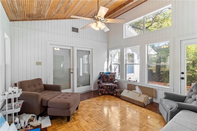 sunroom featuring ceiling fan, wood ceiling, and vaulted ceiling