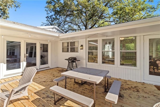 exterior space featuring a grill and a deck