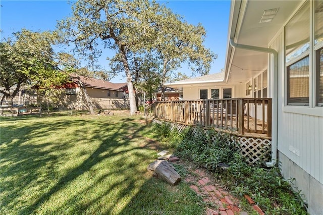 view of yard featuring a deck