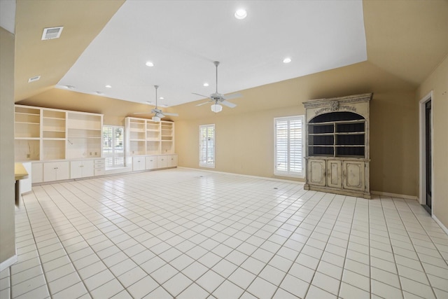 unfurnished living room featuring vaulted ceiling, ceiling fan, and light tile patterned flooring