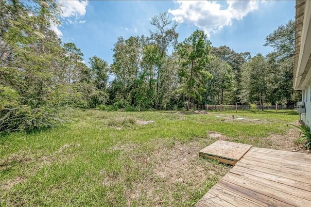 view of yard featuring a wooden deck