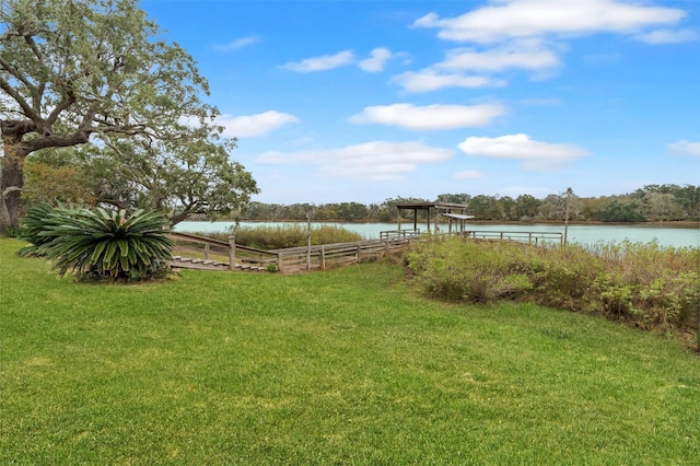 view of yard with a water view