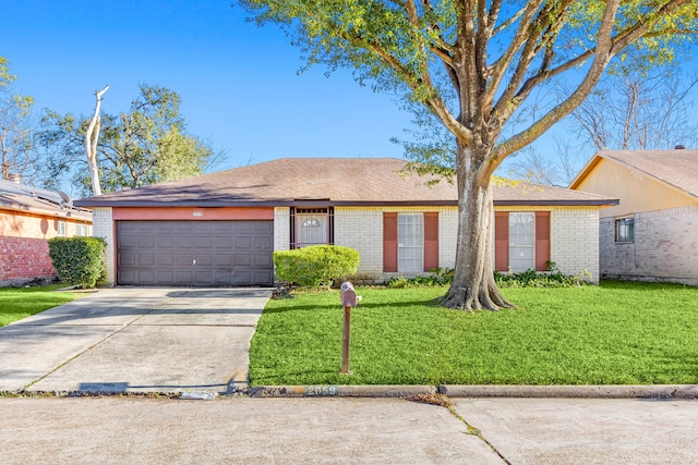 single story home with a garage and a front yard