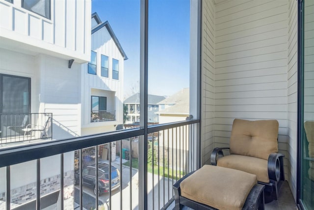 balcony featuring a residential view