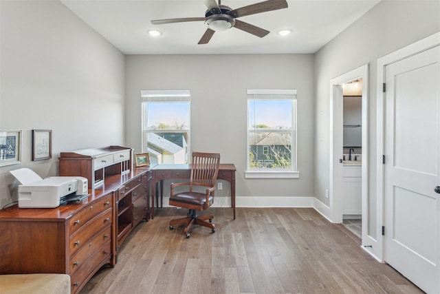 home office featuring recessed lighting, baseboards, light wood-style flooring, and a ceiling fan