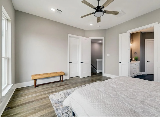 bedroom featuring recessed lighting, visible vents, baseboards, and wood finished floors