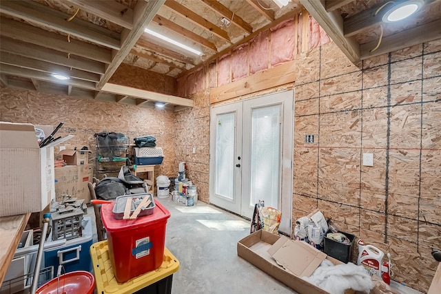 misc room with french doors and concrete floors