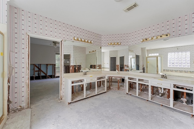 bathroom featuring a workshop area, vanity, ceiling fan, and concrete flooring