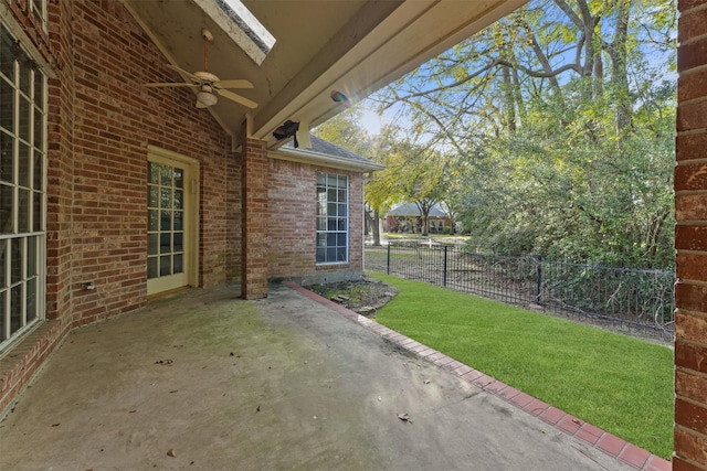 view of patio / terrace featuring ceiling fan