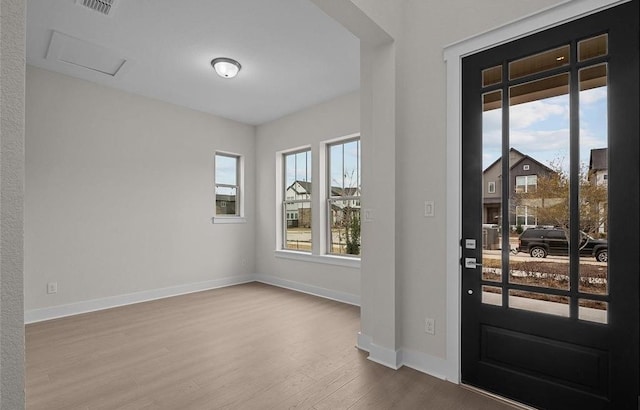 doorway to outside featuring light hardwood / wood-style flooring