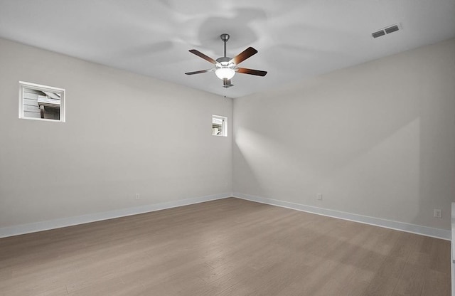 unfurnished room featuring ceiling fan and light hardwood / wood-style floors