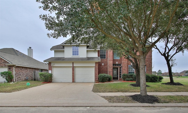 view of front facade with a garage and a front yard