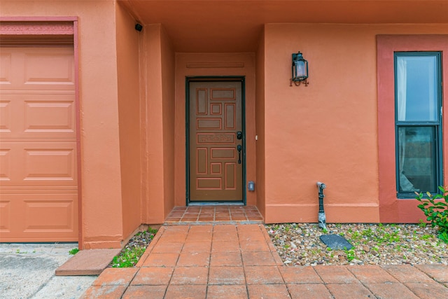 entrance to property with a garage