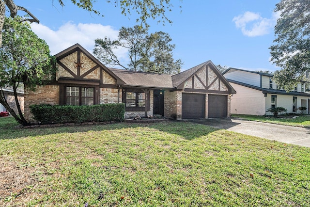 tudor house with a garage and a front yard